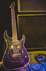 Fototapeta premium Electric symphony: striking gray electric guitar in stage before show