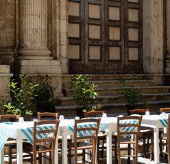 Restaurant chairs and tables on the streets of Ortigia, Siracusa