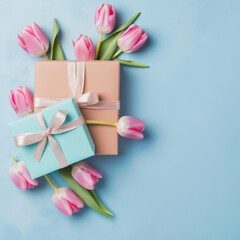Gift box with pink tulips on coler background. Flat lay, top view