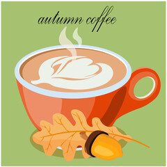 Autumn coffee in a red cup with oak leaves and acorn