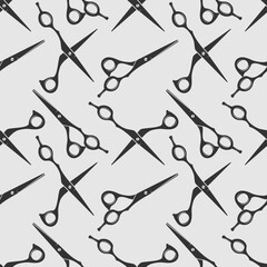 Barbershop seamless pattern with hairdressing scissors. Vector illustration.