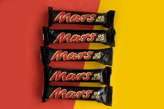 May 30, 2023 Ukraine city Kyiv chocolate bar Mars on a colored background