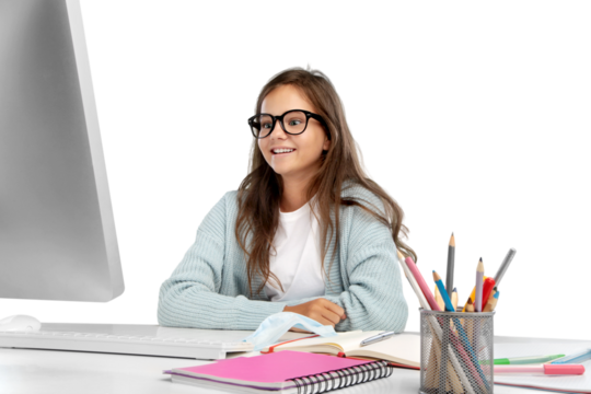 Happy smiling girl student watching learning online video class on a laptop