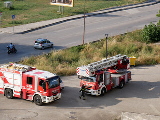 Italy - Two vehicles equipped by the fire brigade after having carried out a rescue