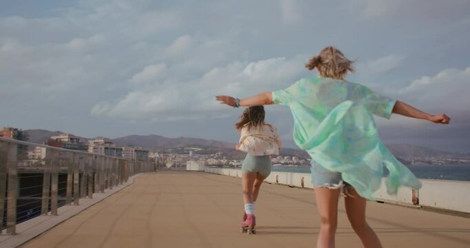 Fun empowering video, of two best friends or queer women rollerblade. Free spirits and souls experience freedom and youth together.Sway and move freely in the wind. Inclusive and supportive
