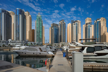 Obraz na płótnie Canvas United Arab Emirates, Dubai Marina skyline cityscape from the bay.