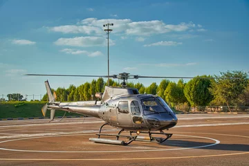 Tuinposter Tourist helicopter before boarding. © Tetlak