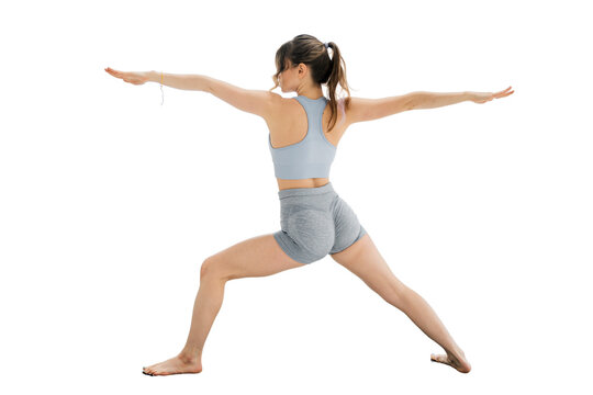 Yoga asana trainer a woman confident in fitness clothes stands and looks away. Transparent background, png.