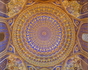 Painted gilded dome of Madrasa Tilya Kori (Registan complex). Gold and blue. Samarkand, Uzbekistan