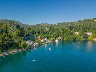 Fototapeta premium Aerial photo Lake Orta in Piedmont (Piemonte), Italy with the St. Julius Island (Isola di San Giulio) and the town of Orta San Giulio in the center