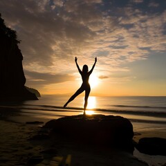 silhouette fitness girl practicing yoga at beach