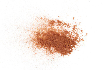 Pile cinnamon powder isolated on white, top view