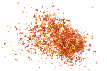 Spicy chili red pepper flakes, chopped, milled dry paprika pile isolated on white, top view