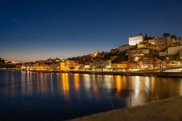 skyline in the evening freom dom luiz brige in Porto on the riverside of Duero river cityscape at...