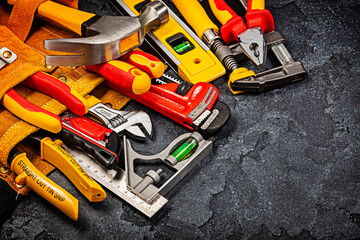 Construction Tools On Black Background.