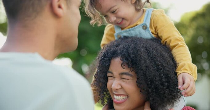 Family, piggyback and a girl playing with her parents outdoor in the garden together for love or bonding. Kids, smile or fun with a mother, father and happy daughter in the backyard for games