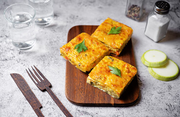 Zucchini carrot cheese bacon casserole slices