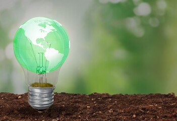 Light Bulb and nature Green Background,