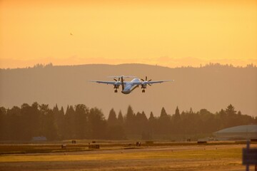 Mesmerizing Early Morning Takeoff: Commercial Airplane Soaring into the Sky in Crystal Clear 4K Resolution