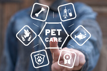 Man working on virtual touch screen of future touches inscription: PET CARE. Concept of Pet Care....