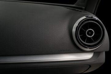 Air conditioning system and airbag panel. Car dashboard.