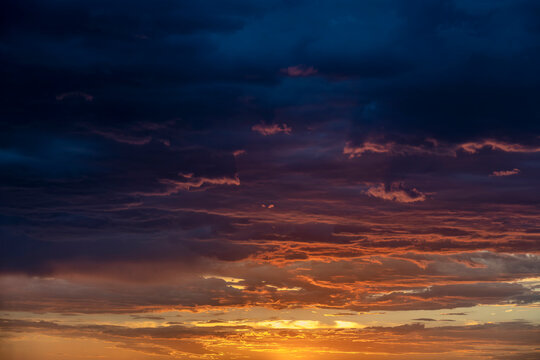 USA, Arizona, Tucson, Dramatic storm clouds at sunset