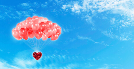 Red heart-shaped diamond and red balloons bright sky background valentines day concept