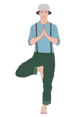 Man meditating in yoga tree pose outdoors. He always has the spirit of yoga. casual attire.