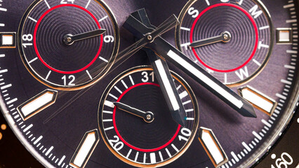 Close-up wristwatch shows 5:20 p.m.