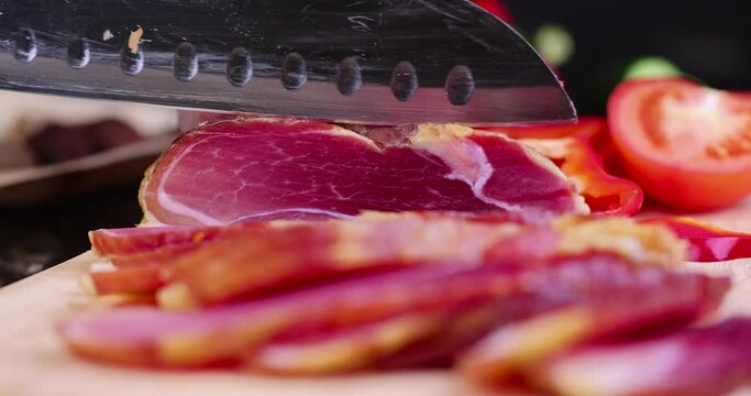 cut pink dry pork ham, close-up of pork dry ham during cooking