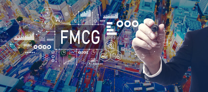 FMCG - Fast Moving Consumer Goods theme with businessman in a city at night