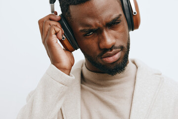 man dj fashion posing american headphones beige guy background music african black portrait