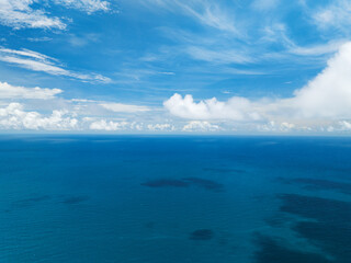 Aerial view of a blue sea surface water texture background,Amazing sun reflections,Aerial flying over sea drone view,Waves water surface texture ocean,Open sea background