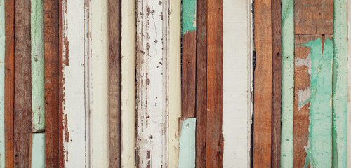 Pastel old wood panel background. Vintage wood texture from house wall.