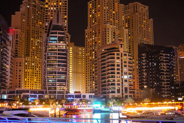 Fototapeta na wymiar Dubai Marina in Dubai, UAE. View of the skyscrapers and the canal, view at night