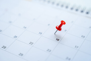 Red pin on the 16th day on the calendar, appointments and meeting reminders.