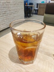 Iced tea in the glass. Very cold and soothing.