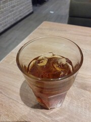 Iced tea in the glass. Very cold and soothing.