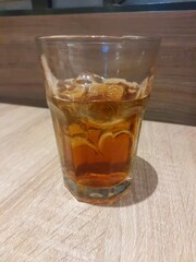 Iced tea in the glass. Very cold and soothing.
