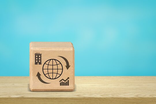 Multinational corporation concept, wooden cube with icon