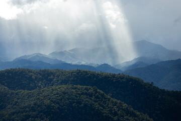 Top view Landscape of Morning Mist with Mountain Layer at north of Thailand. mountain ridge and clouds in rural jungle bush forest