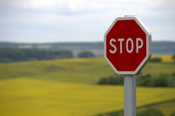 Safety First: Stop Sign Near the Farm