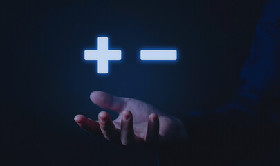 plus and minus sign Concept of resistance. Decision. Positive or negative business choice....