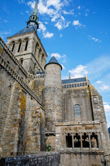 Fototapeta na wymiar Part of Mont Saint Michele abbey in a beautiful summer day, France