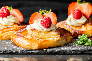 Delicious flaky fresh baked Danish Pastry with Chantilly cream and fresh fruit.