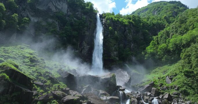 Powerful Foroglio waterfall in springtime. Aerial drone view