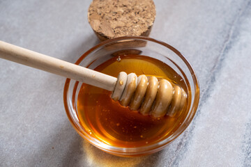 honey dripping from a glass