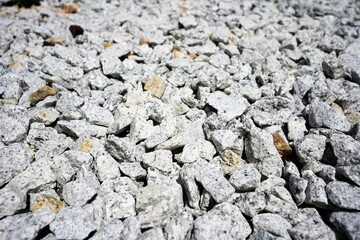 White stones texture. Small garden stones background.