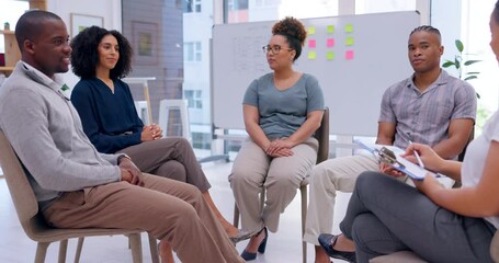 Community, support and psychology with business people in workshop for teamwork, mental health or empathy. Human resources, communication or team building with employees in circle for seminar meeting