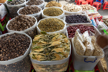 Vietnamese herbs, spices and dried goods Binh Tay market in Chinatown, Cho Lon, Ho Chi Minh City - obrazy, fototapety, plakaty